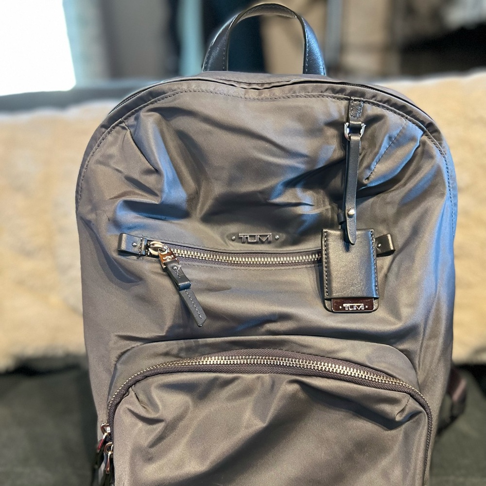 Tumi gray backpack